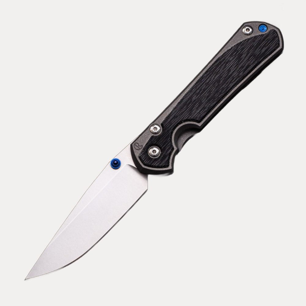 LARGE SEBENZA 31 BLACK CANVAS MICARTA INLAY – CPM MAGNACUT BLADE – BLUE DOUBLE THUMB LUGS