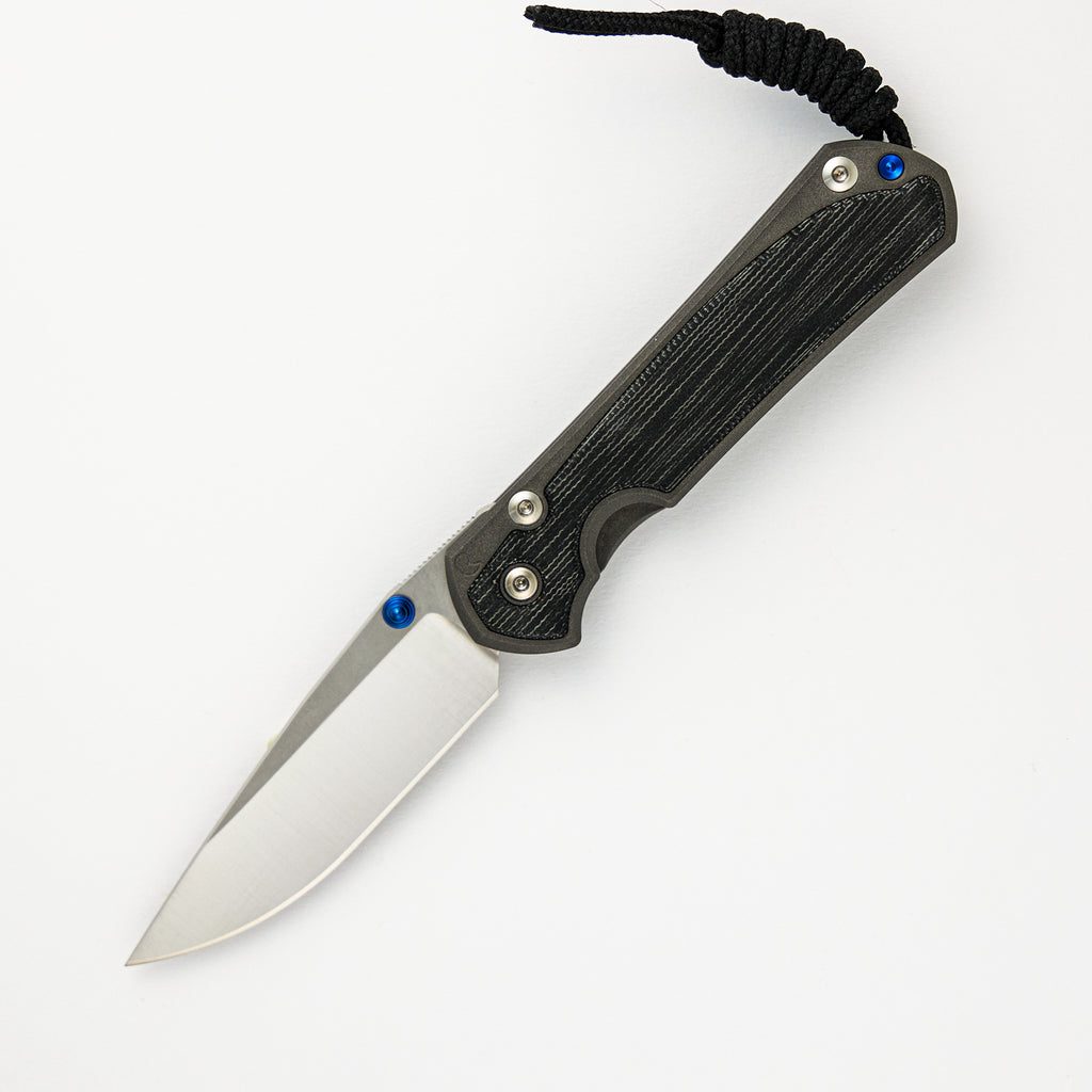 LARGE SEBENZA 31 BLACK CANVAS MICARTA INLAY – POLISHED CPM MAGNACUT BLADE – BLUE DOUBLE THUMB LUGS