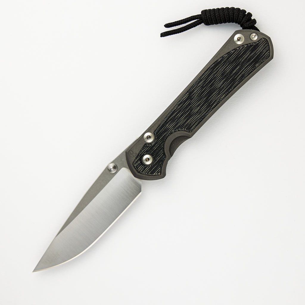 LARGE SEBENZA 31 BLACK CANVAS MICARTA INLAY – POLISHED CPM MAGNACUT BLADE – SILVER DOUBLE THUMB LUGS