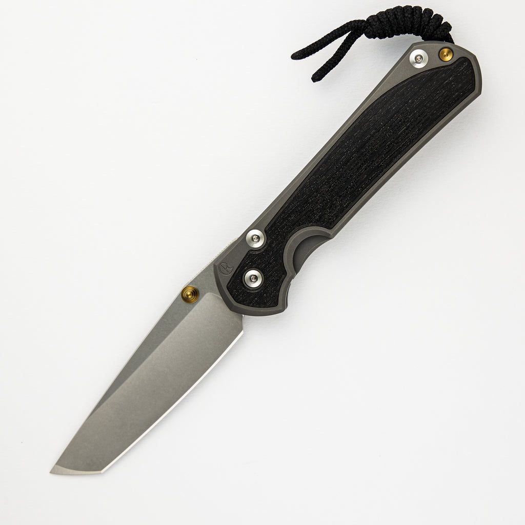 LARGE SEBENZA 31 BOG OAK INLAY – TANTO CPM MAGNACUT BLADE – GOLD DOUBLE THUMB LUGS