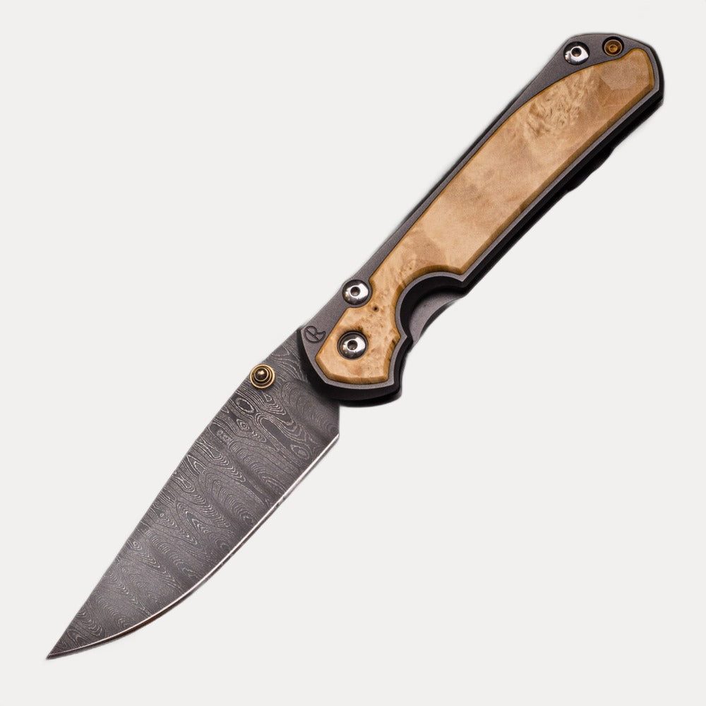LARGE SEBENZA 31 BOX ELDER BURL INLAY – LADDER BLADE – GOLD DOUBLE THUMB LUGS