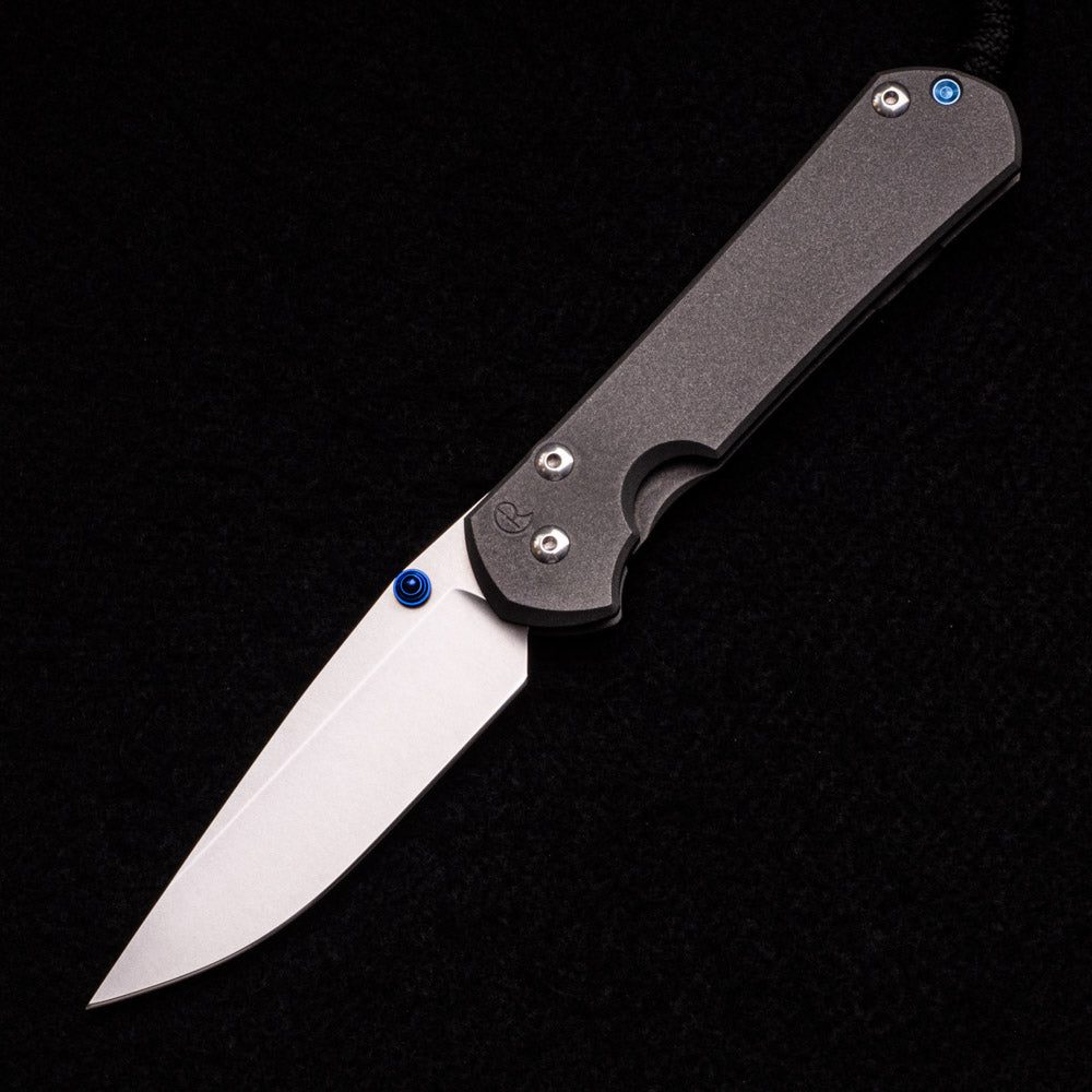 LARGE SEBENZA 31 PLAIN – DROP POINT CPM S35VN BLADE – BLUE DOUBLE THUMB LUGS