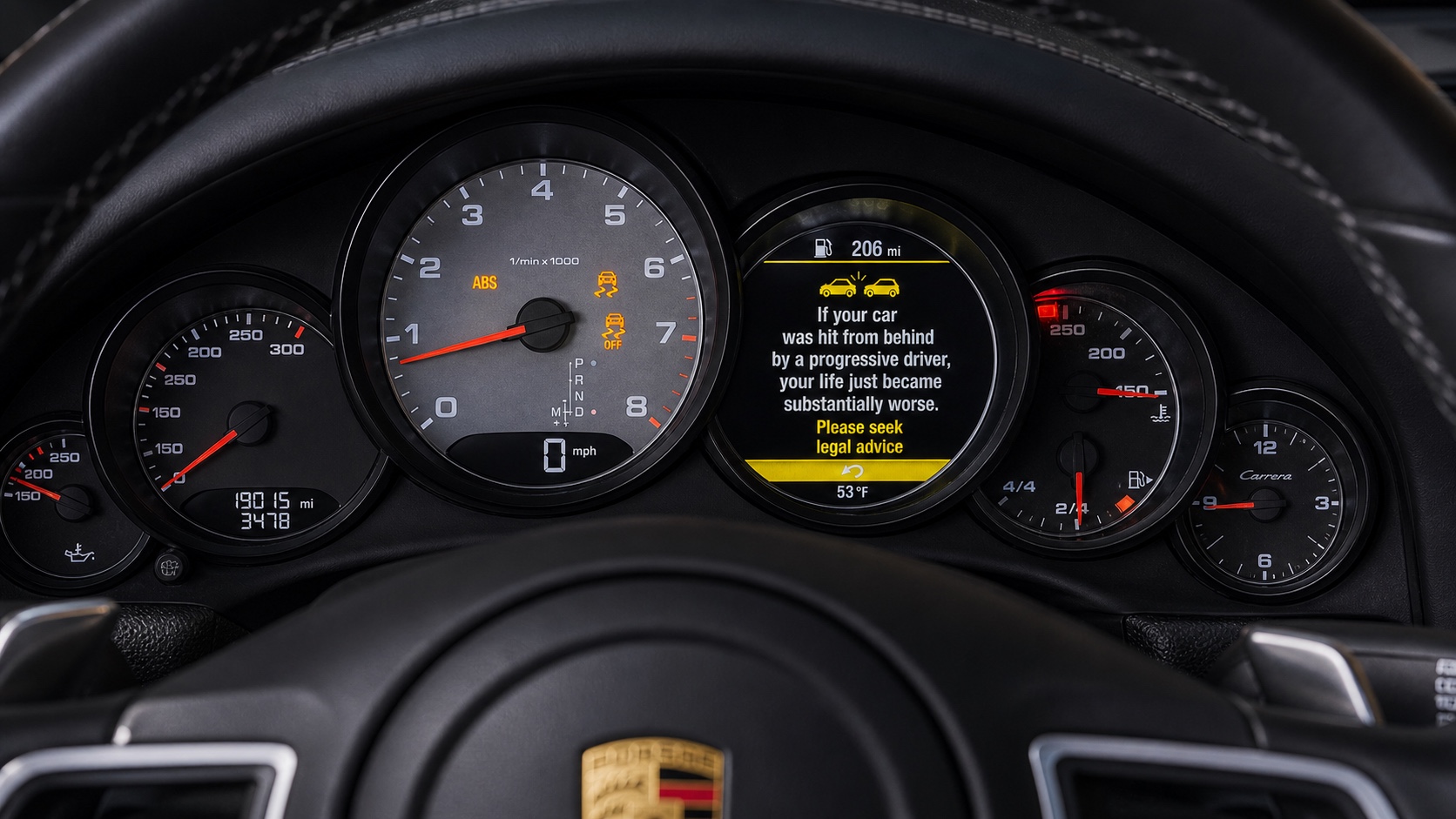 Porsche 911 Carrera 4S instrument cluster. The center multi-function display reads: 'If your car was hit from behind by a progressive driver, your life just became substantially worse. Please seek legal advice.' Cabin temperature 53 F.