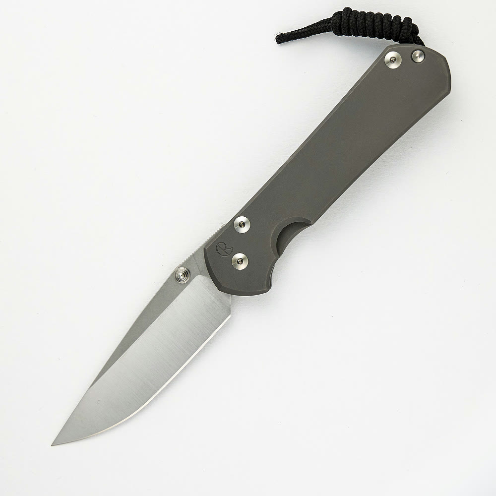 Large Sebenza 31 in glass blasted titanium, open, show side.