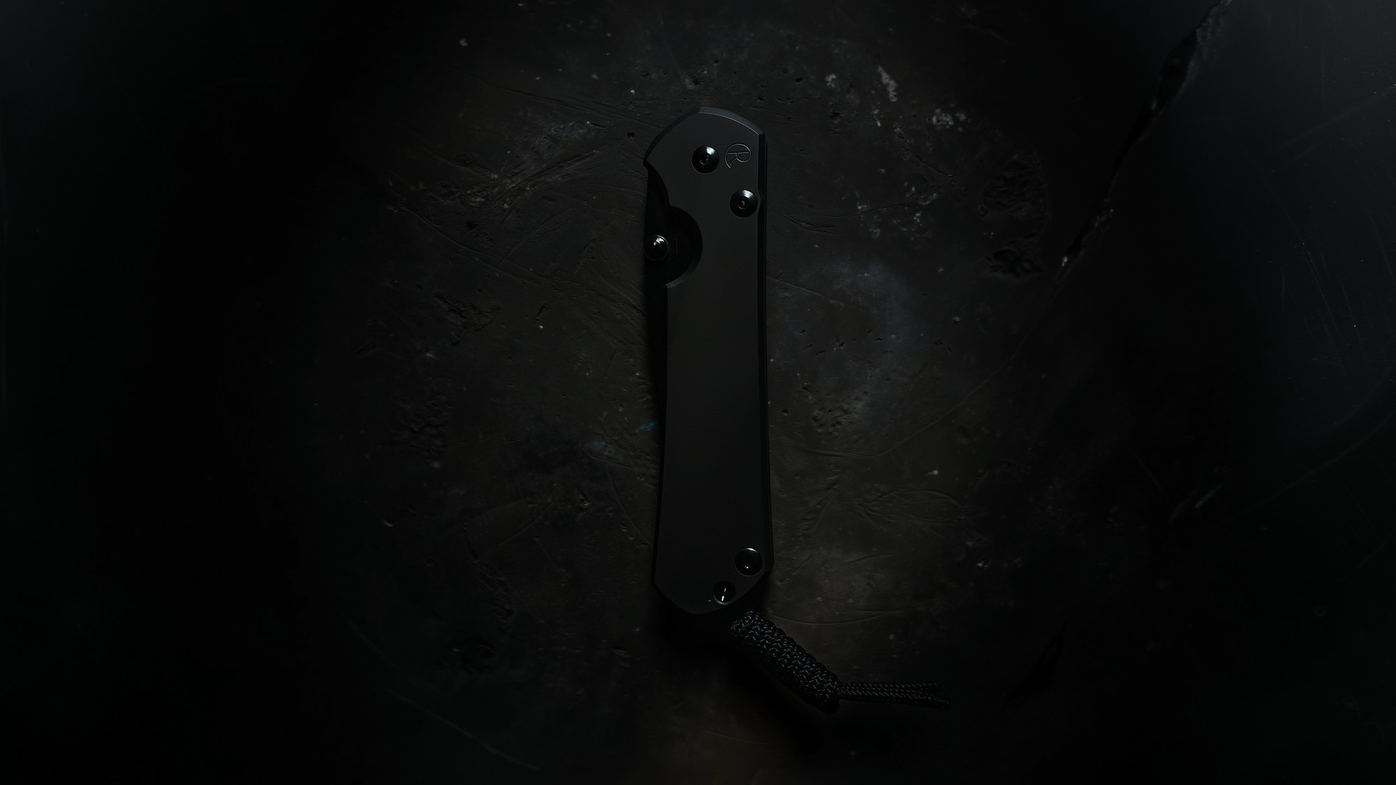 A Hawk Talon in bronze titanium and carbon fiber, close.