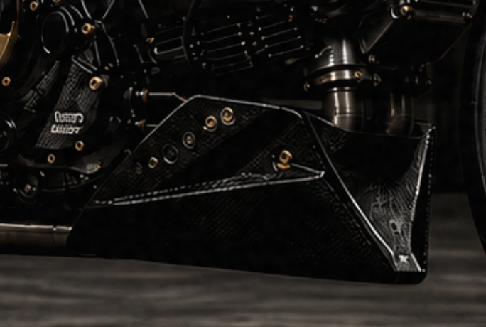Custom carbon race belly pan shown beneath the Ducati SportClassic engine