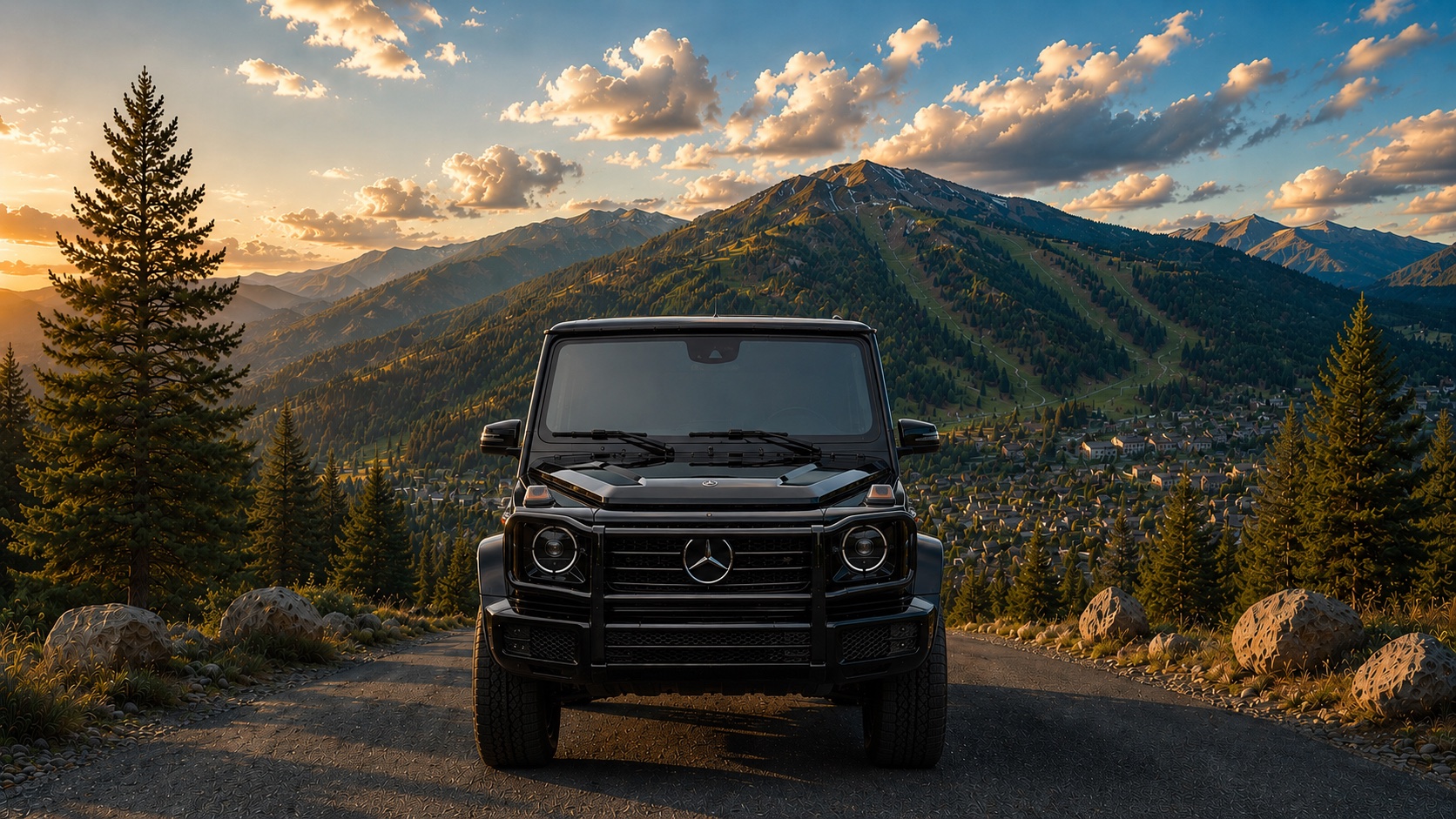 A black Mercedes-Benz G-Class on a mountain road at sunset, ski runs cut into the peak and a town in the valley below — Park City's Wasatch Back.